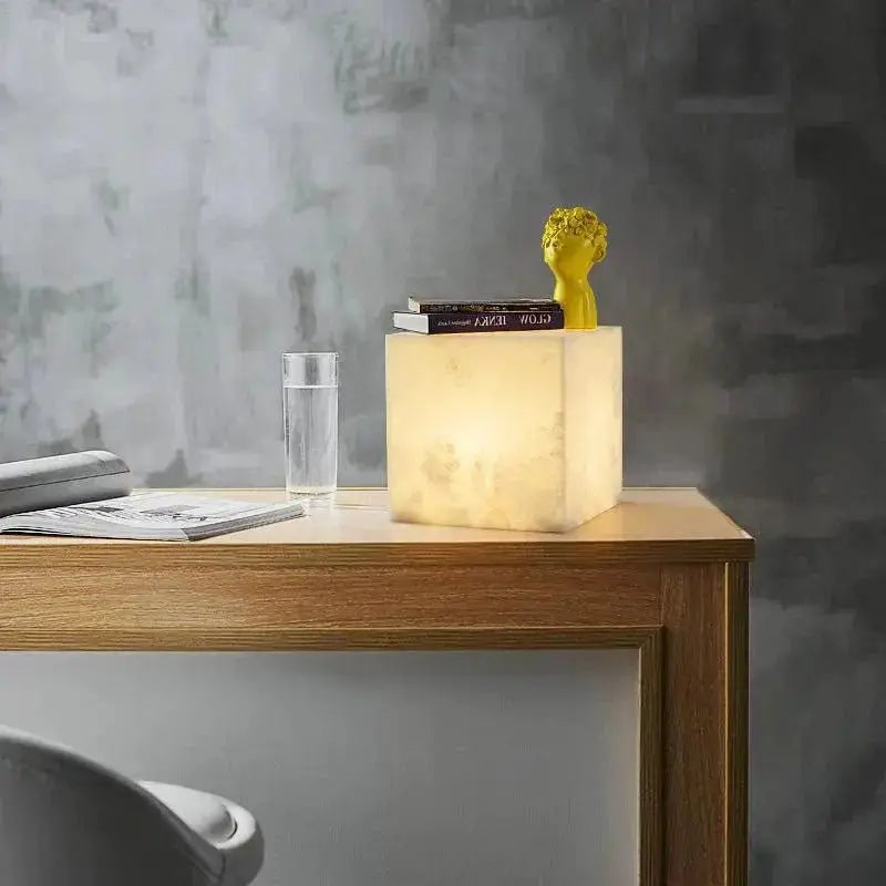 Elegant Fabtiko® Alabaster Cubic Table Lamp Illuminating On a Desk